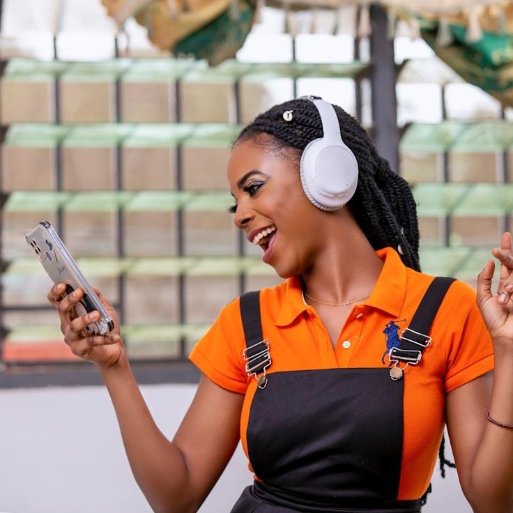 Asha Rao, Lead Design Curator at Innovative Work Space, reviewing corporate floral arrangements